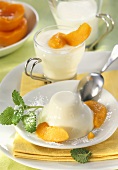 Vanilla yoghurt dessert with tinned peaches
