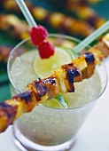 Barbecued meat and pineapple kebab on lime sorbet