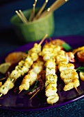 Breaded squid on skewers