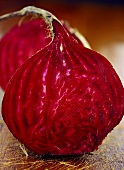 Red Beet with Leaves; Cut in Half