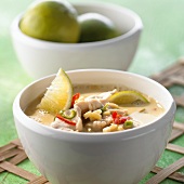 Coconut soup with pork and limes