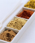 Various spices in bowls (for curry)