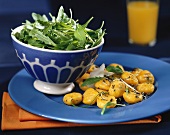 Potato and pumpkin gnocchi with rocket salad