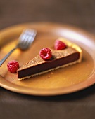 A Slice of Devil's Food Cake with Raspberries
