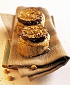 Baguette with barbecued aubergine, hummus and sesame