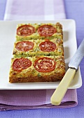 Courgette quiche with tomatoes and Cheddar