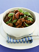 Caramelised chicken with green beans and onions