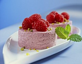Raspberry quark cake with chopped pistachios