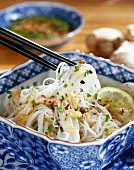 Rice noodle salad with sweet and sour ginger dressing