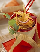 Soya noodles with onions in a bowl