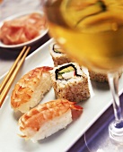 Nigiri sushi with shrimps and California roll