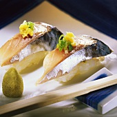 Two nigiri sushi with mackerel