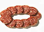 Slices of salami, laid out in a circle