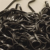 Black ribbon noodles coloured with cuttlefish ink