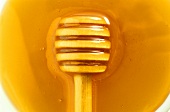Honey with honey spoon (detail)