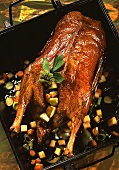 Roast goose with quinces and spring onions
