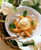 Vanilla ice cream with fried apple wedges