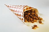 Roast almonds in a paper bag