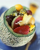 Exotic fruit salad in a melon