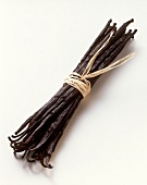 Several vanilla pods, tied together