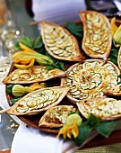 Courgette tarts with rosemary and thyme