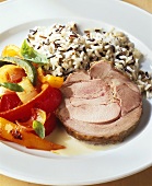 Roast turkey roll with wild rice mixture and peppers