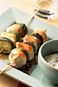 Chicken and courgette kebab with banana and coconut dip