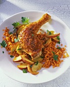Chicken leg with red lentils and apple wedges