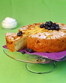Apple cake, decorated with blueberries