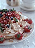 Meringue tart with cream and mixed berries