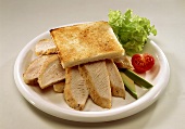 Chicken breast fillet with avocado and toast
