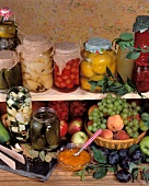 Still life: bottled fruit, vegetable and fruit basket