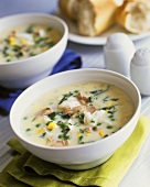 Creamy fish soup in soup bowl