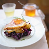 Duck breast on red cabbage and potatoes