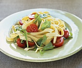Ribbon pasta with rocket and cherry tomatoes