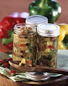 Courgette and pepper chutney in screw-top jars