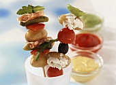 Colourful potato kebabs with dips