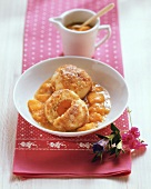 Apricot dumplings with buttered breadcrumbs and apricot compote