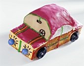 Colourful car cake for child's birthday