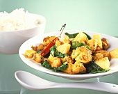 Chicken curry with pineapple and spinach; rice