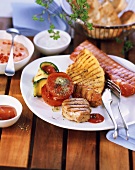 Mixed grill with meat, bacon and vegetables; dips; ciabatta