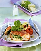 Chicken breast stuffed with herb butter, cheese and ham