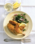 Breaded poussin with parsley salad