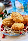 Deep-fried cheese, garnished with fresh cranberries