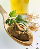 Herb mustard on wooden spoon