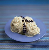 Lavender ice cream on blue plate
