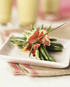 Green beans with Parma ham, tied together
