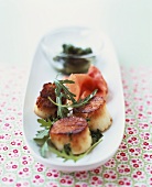 Fried scallops with Parma ham and rocket