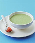 Cold avocado soup with diced tomato