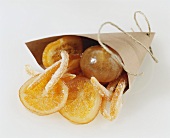 Candied oranges in paper bag